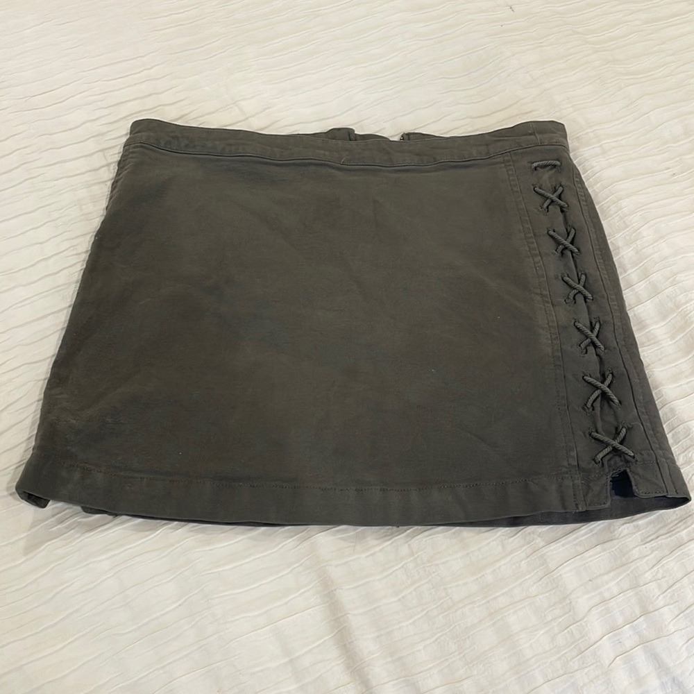 Dark green mini skirt